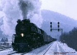 C&O 614T, 4-8-4 Greenbrier, running test for the ACE program, hauling coal on the C&O between Huntington, and Hinton WV at Cabin Creek, West Virginia. January 10, 1985. 